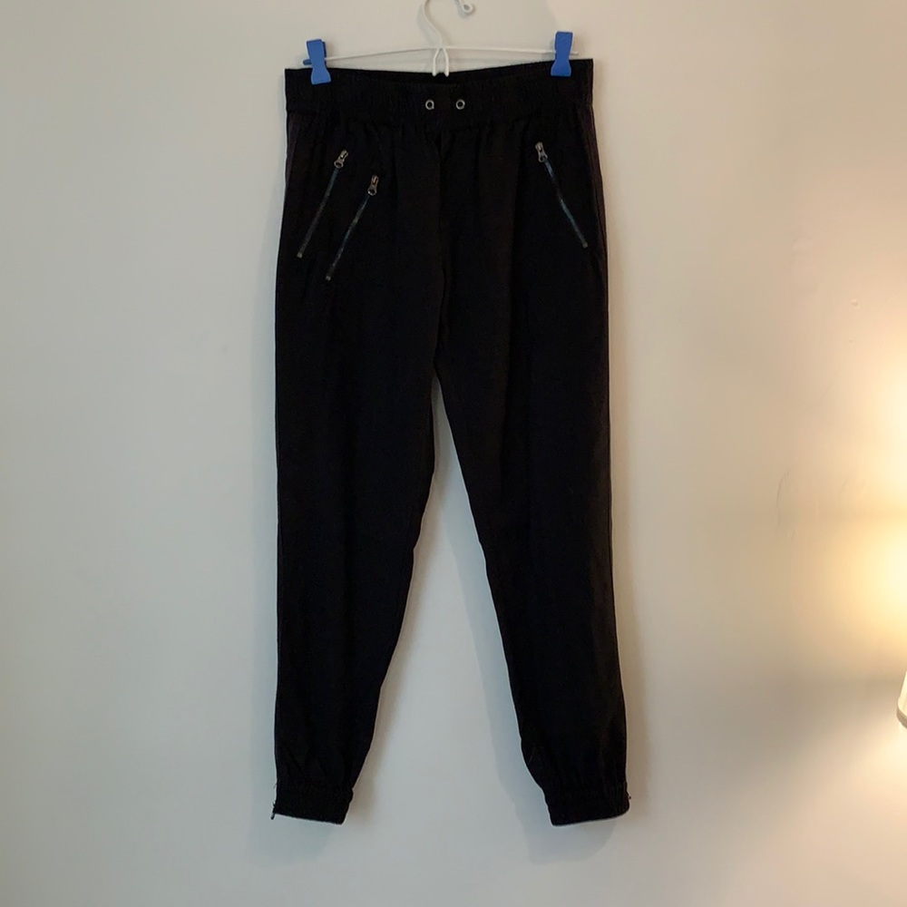 Fate black joggers with zipper detail